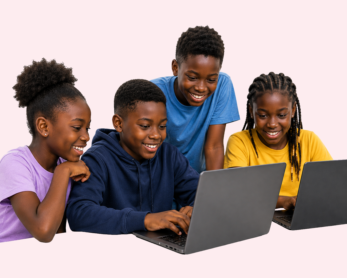Campers learning to code on laptops